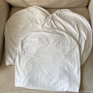Three Snoo bassinet fitted sheets